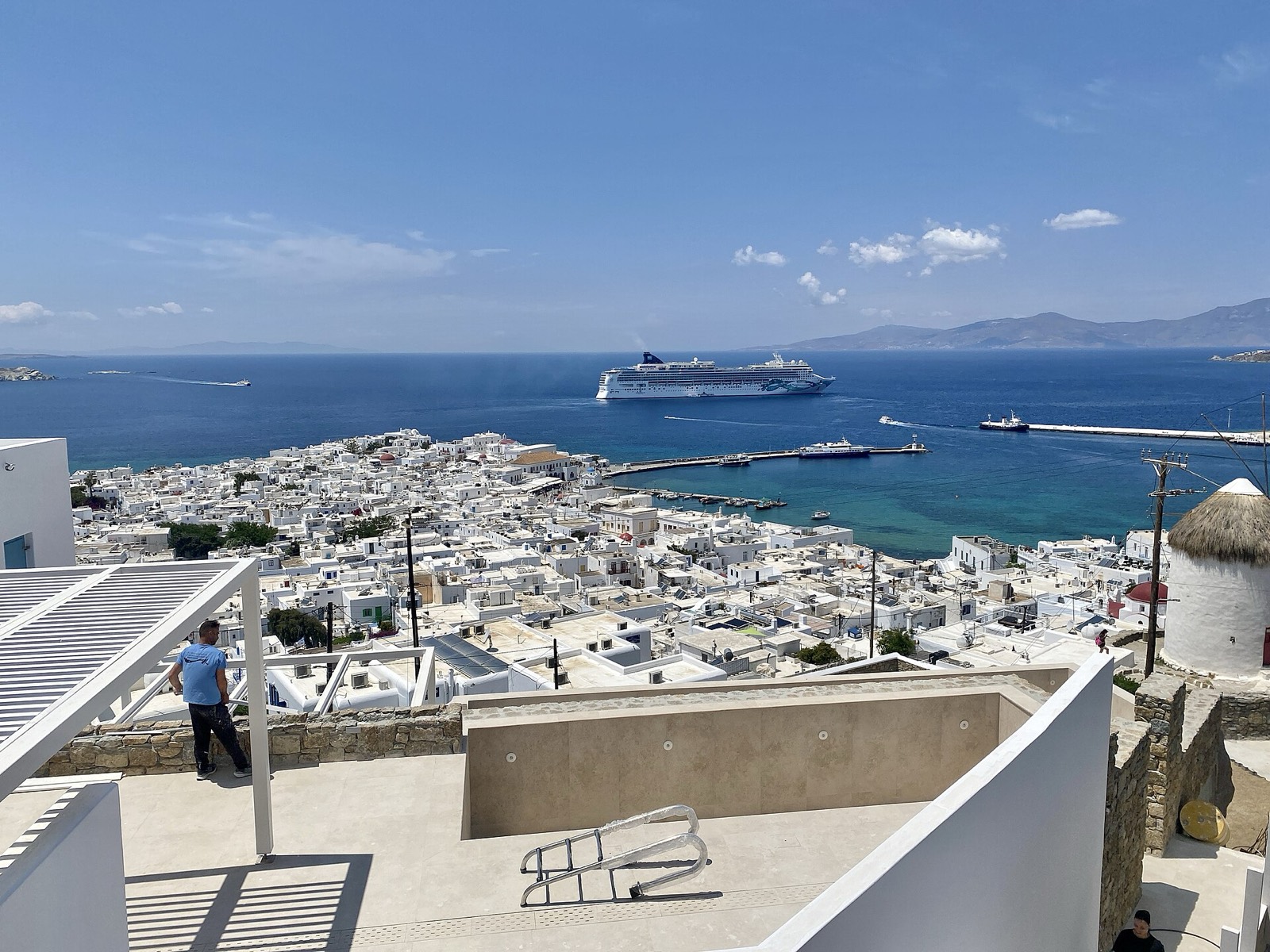 Whitewashed Chora and its harbour seen from the lookout above the town