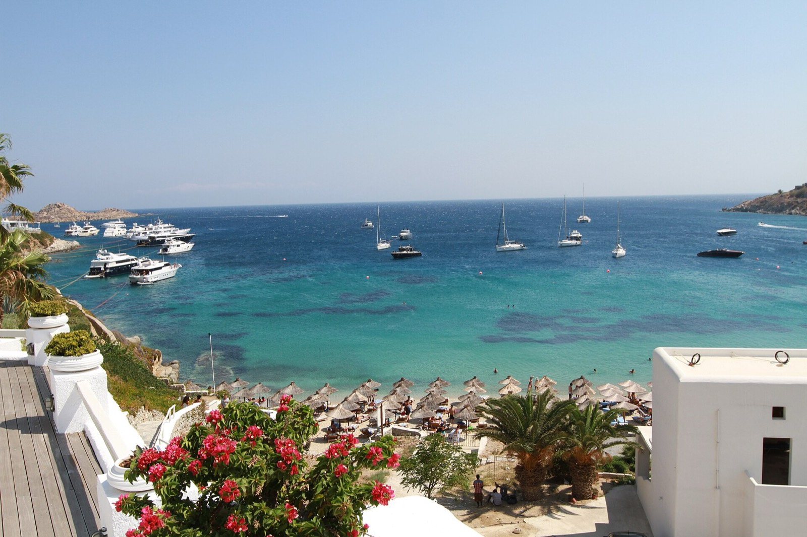 Turquoise water at Psarou, the polished cove on the south coast of Mykonos